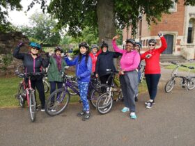 Group of women on bikes,
